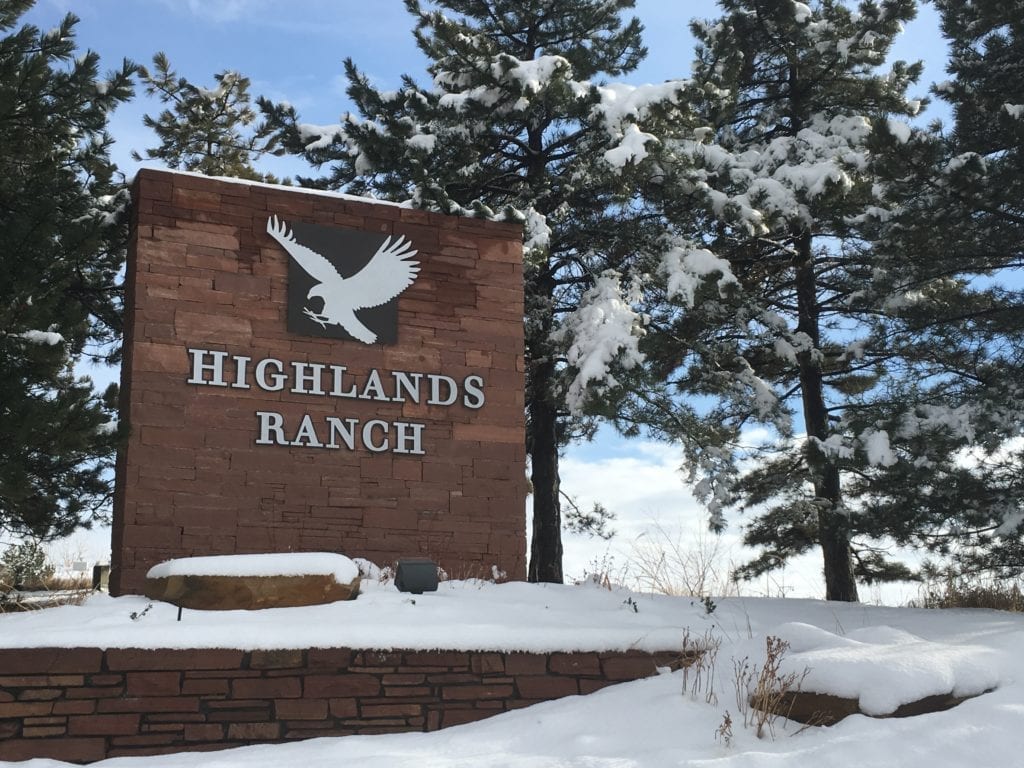 Highlands Ranch city sign covered in snow