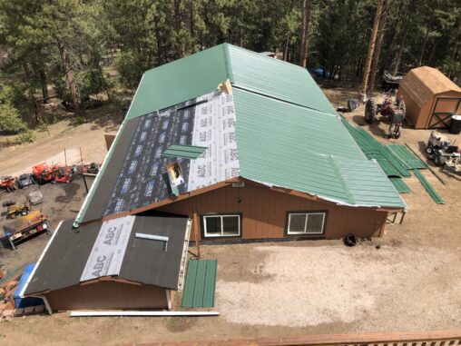 New green standing seam metal roofing installation in Evergreen CO by New Roof Plus