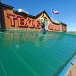Commercial standing seam metal roofing installed by New Roof Plus